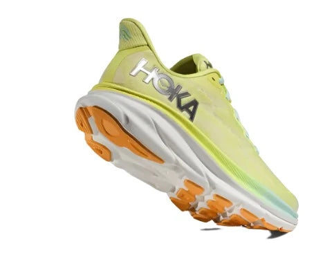 Back angle view of the Women's Clifton 9 by HOKA in the color Citrus Glow/Sunlit Ocean