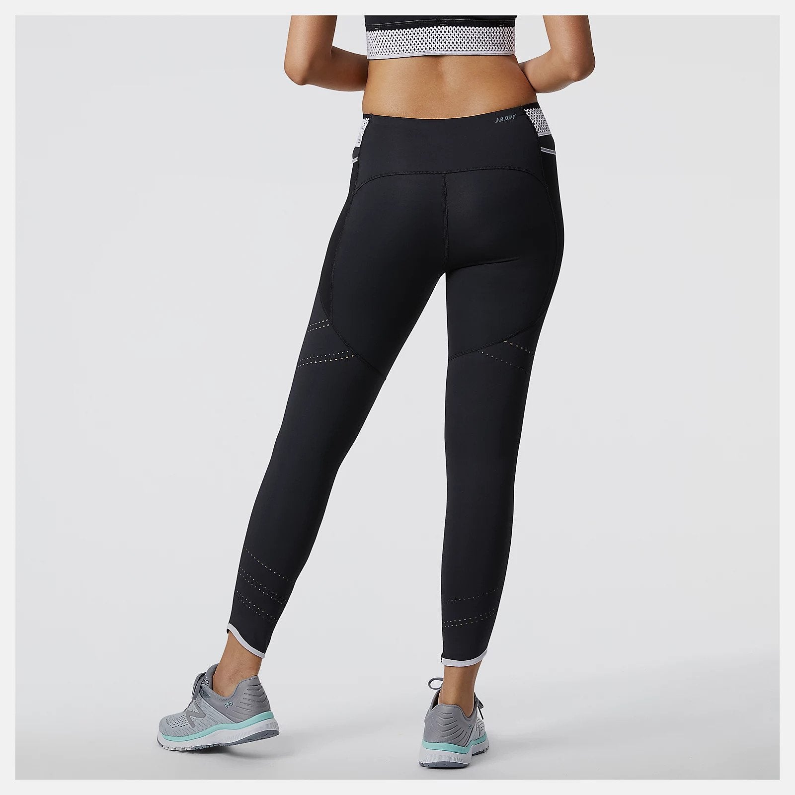 Made for your run or workout, our versatile Q SPEED Shape Shield Tight uses Shape Shield fabric to offer coverage and a lightweight, soft feel so you stay focused on your performance. With NB DRYx to wick away moisture, these women's workout leggings also have mesh panel pockets and perforations for added breathability and a hint of style. Drop-in mesh pockets leave space for the essentials.