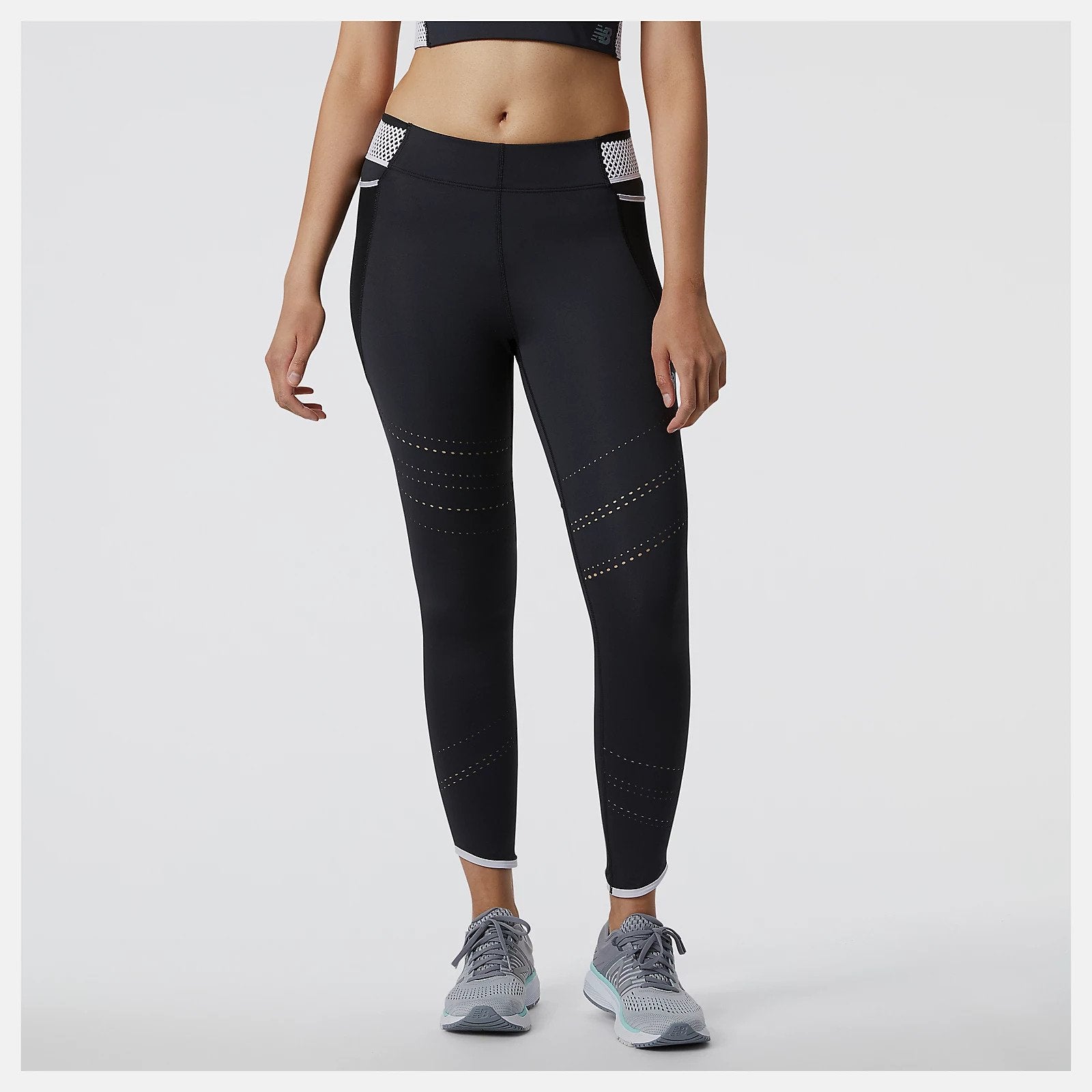 Made for your run or workout, our versatile Q SPEED Shape Shield Tight uses Shape Shield fabric to offer coverage and a lightweight, soft feel so you stay focused on your performance. With NB DRYx to wick away moisture, these women's workout leggings also have mesh panel pockets and perforations for added breathability and a hint of style. Drop-in mesh pockets leave space for the essentials.