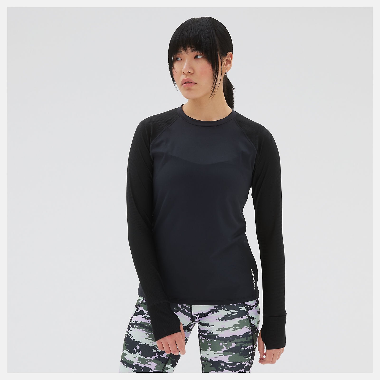 The Shape Shield Long Sleeve is an innovative performance essential. Featuring Shape Shield and moisture-wicking NB DRY technology, this women’s athletic top delivers premium stretch and coverage while remaining super soft and lightweight. Designed for your comfort and convenience, the longer raglan sleeves are crafted from a breathable power mesh with thumbholes and a small key storage pocket at the cuff.