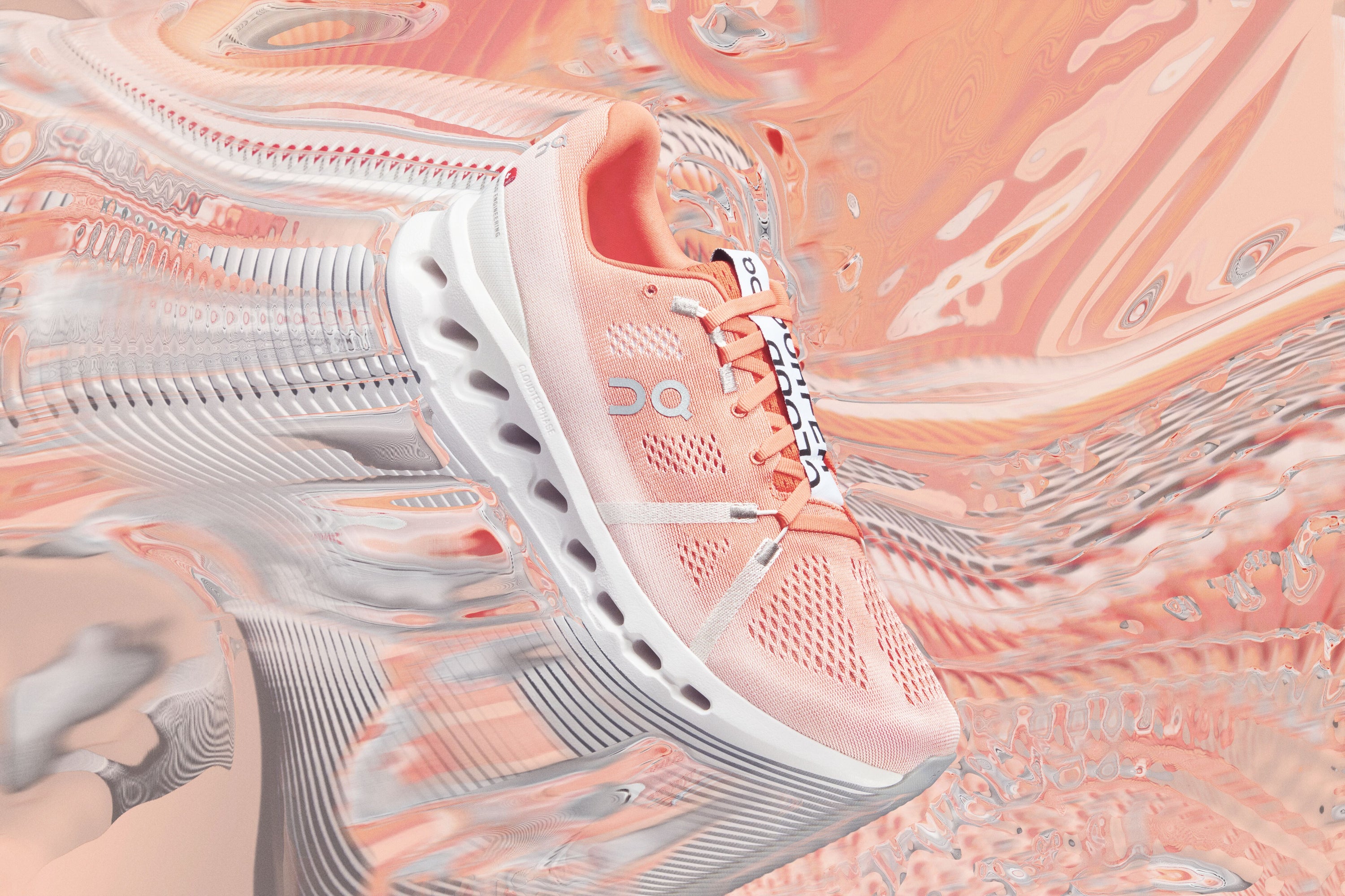 Artistic swirly lateral image of the CloudSurfer shoe by ON in peach surrounding by peach swirls as a background