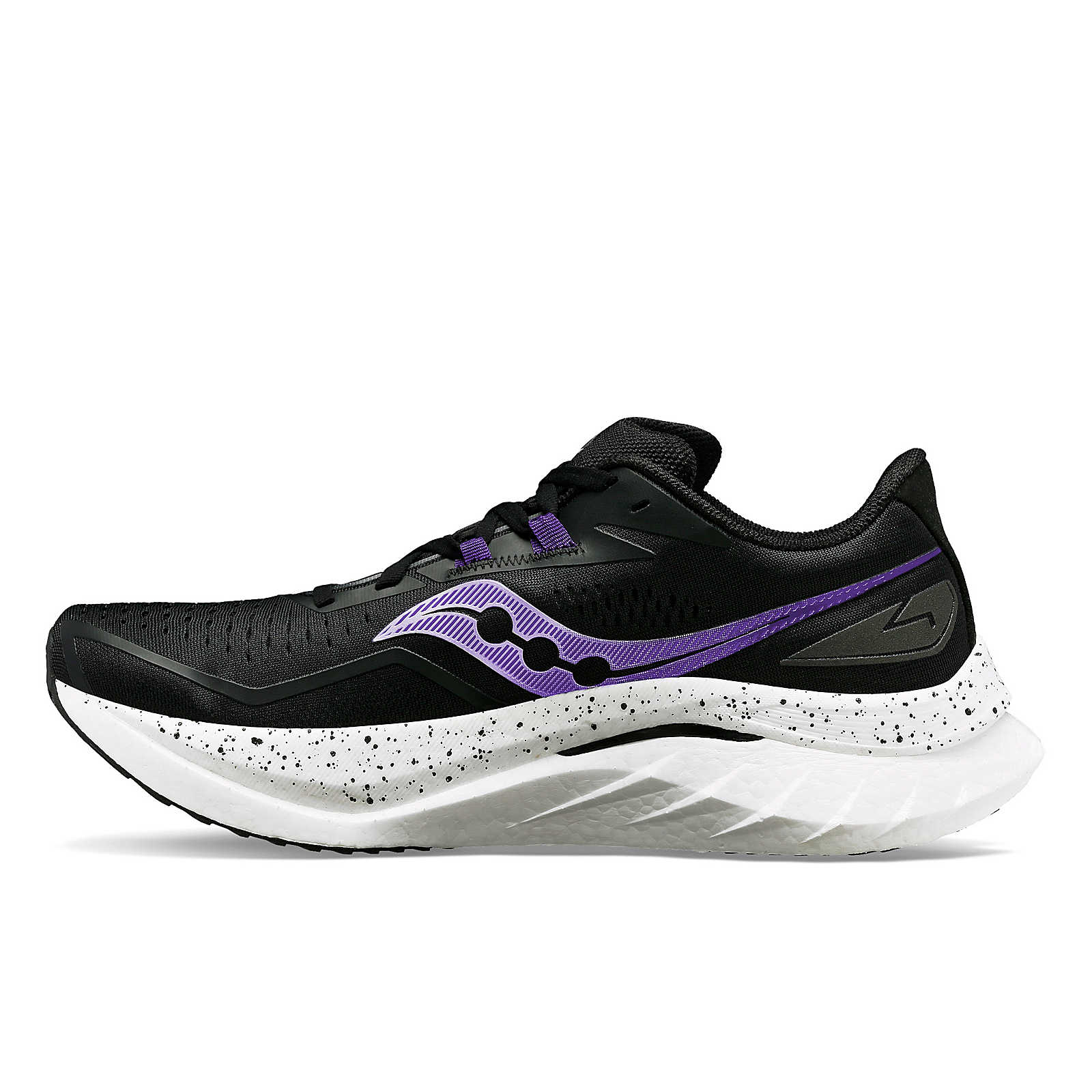 The medial side of the Black Endorphin Speed 4 for women has a spckled midsole on top of a white midsole.  It brings a fashion look to a fast shoe