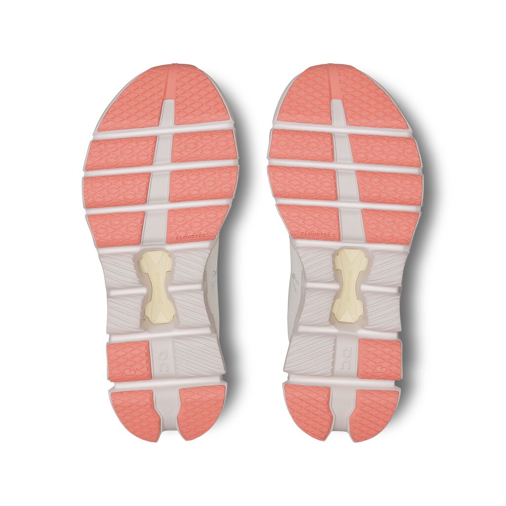 The outsole of this Women's On X54 has a peach color under the forefoot  and heel