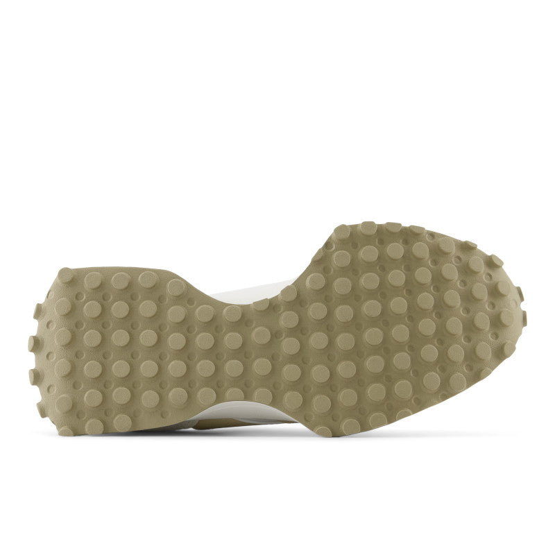 The outsole pattern of this shoe is a gum rubber with circular treads