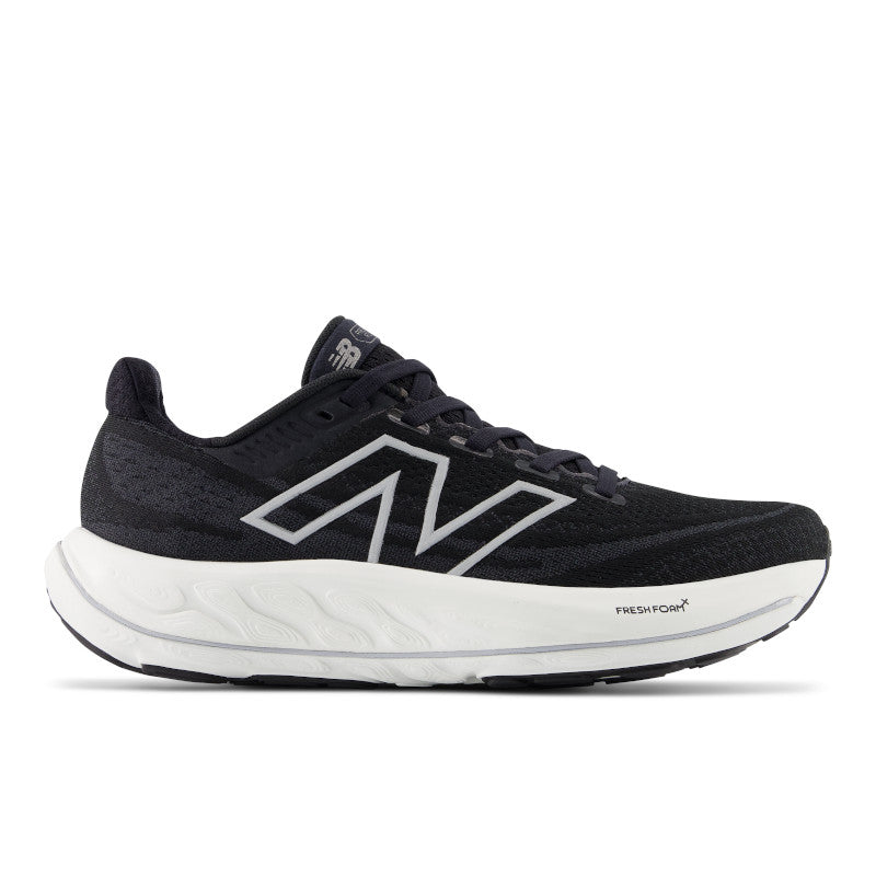 The lateral view of the Women's Vongo V6 shows the black upper  with the N logo that is outlined in white